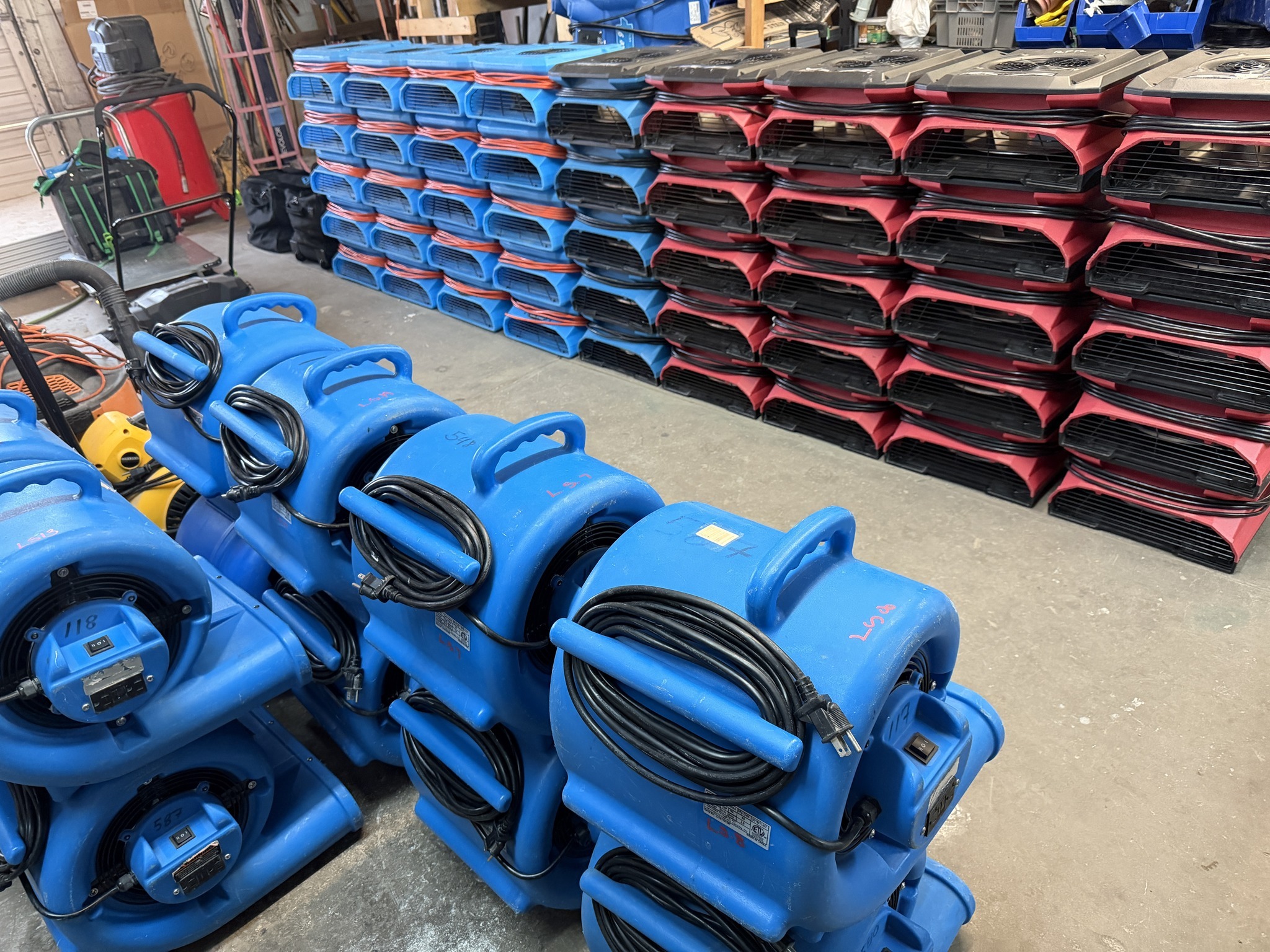 Stars and Bars equipment warehouse - air movers and dehumidifiers ready to deploy